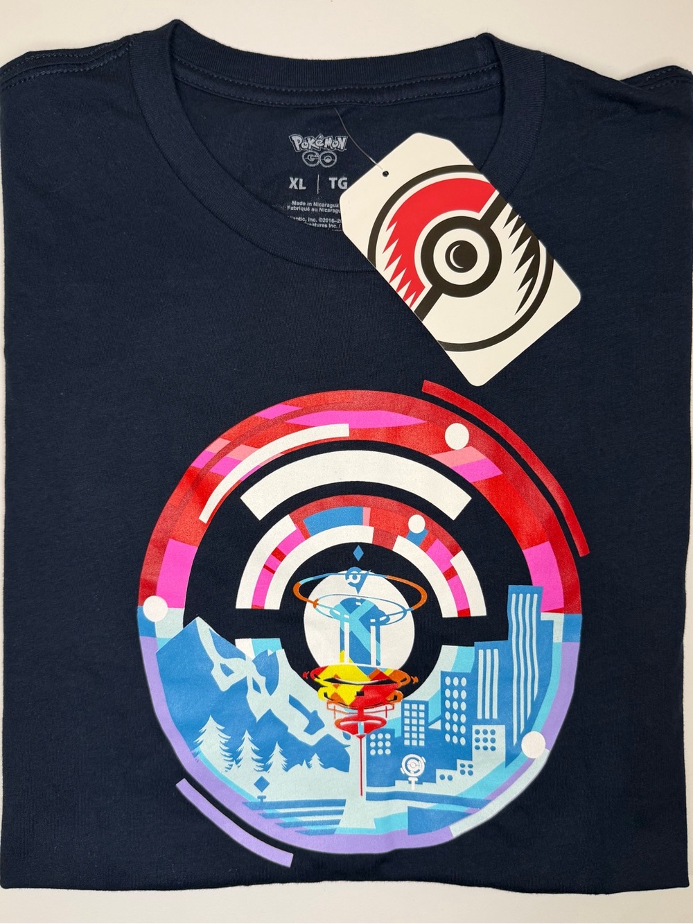 Pokemon Navy Blue Short Sleeve Tee with Multicolor Circular Graphic